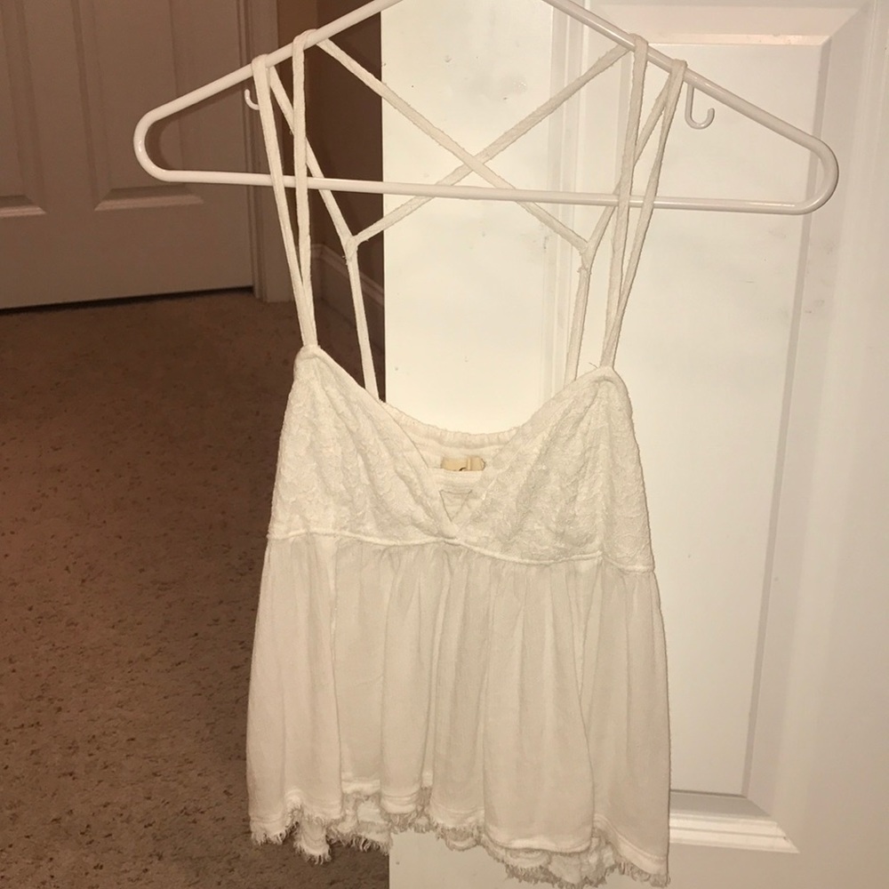 Strait white tank top with frayed detail